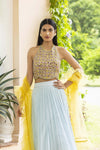 Buy stunning ice blue mirror work lehenga online in USA with yellow ruffle dupatta. Dazzle on weddings and special occasions with exquisite Indian designer dresses, sharara suits, Anarkali suits, wedding lehengas from Pure Elegance Indian fashion store in USA.-full view