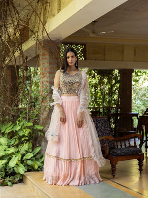 Shop beautiful salmon pink mirror work lehenga online in USA with dupatta. Dazzle on weddings and special occasions with exquisite Indian designer dresses, sharara suits, Anarkali suits, wedding lehengas from Pure Elegance Indian fashion store in USA.-full view