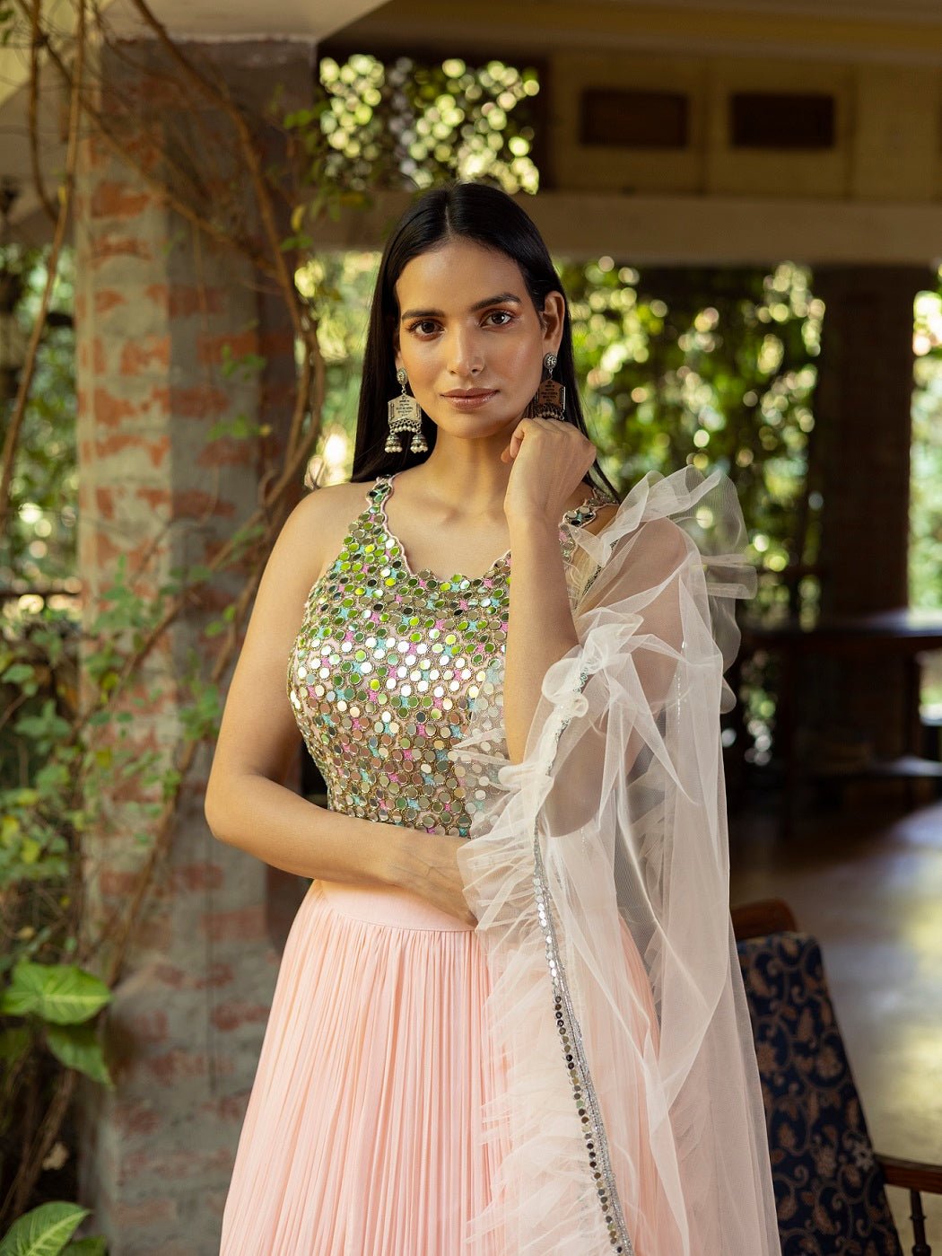 Shop beautiful salmon pink mirror work lehenga online in USA with dupatta. Dazzle on weddings and special occasions with exquisite Indian designer dresses, sharara suits, Anarkali suits, wedding lehengas from Pure Elegance Indian fashion store in USA.-closeup