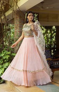Shop beautiful salmon pink mirror work lehenga online in USA with dupatta. Dazzle on weddings and special occasions with exquisite Indian designer dresses, sharara suits, Anarkali suits, wedding lehengas from Pure Elegance Indian fashion store in USA.-skirt