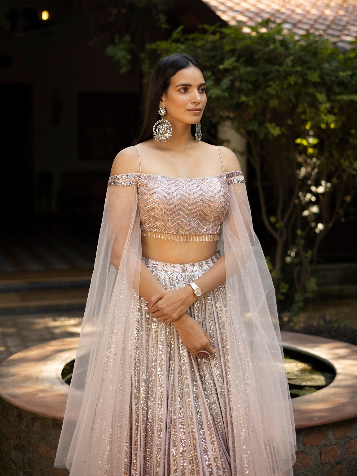 Buy stunning ombre peach shimmer designer lehenga online in USA with dupatta. Dazzle on weddings and special occasions with exquisite Indian designer dresses, sharara suits, Anarkali suits, wedding lehengas from Pure Elegance Indian fashion store in USA.-front