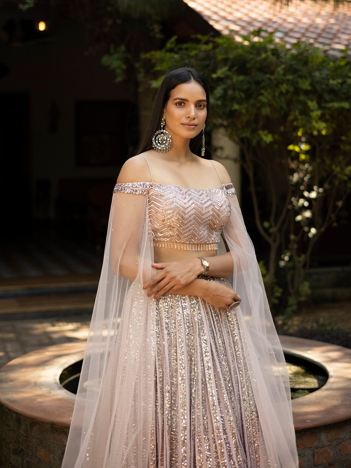 Buy stunning ombre peach shimmer designer lehenga online in USA with dupatta. Dazzle on weddings and special occasions with exquisite Indian designer dresses, sharara suits, Anarkali suits, wedding lehengas from Pure Elegance Indian fashion store in USA.-closeup