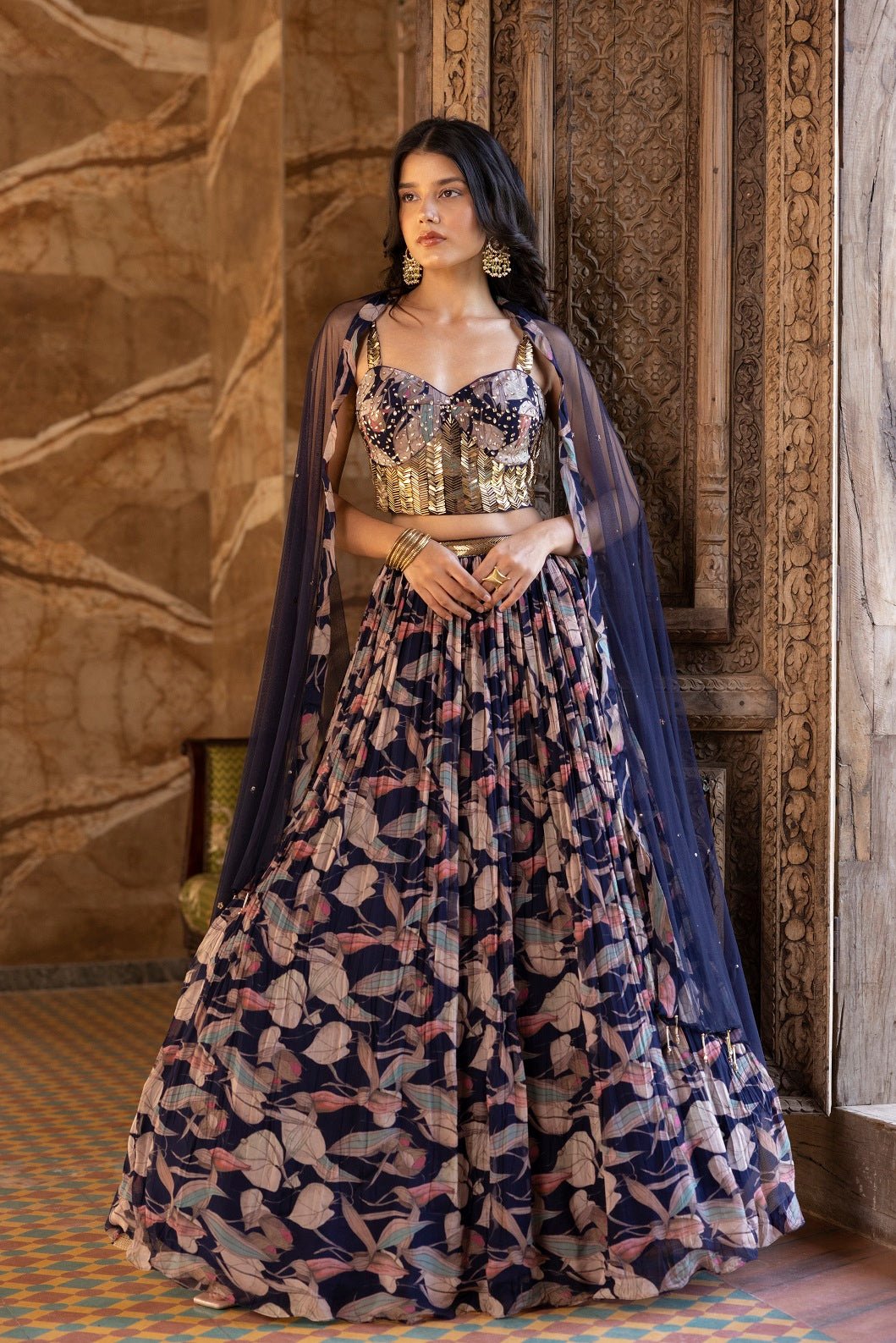 Shop beautiful blue embroidered floral lehenga online in USA with dupatta. Dazzle on weddings and special occasions with exquisite Indian designer dresses, sharara suits, Anarkali suits, bridal lehengas, sharara suits from Pure Elegance Indian clothing store in USA.-front
