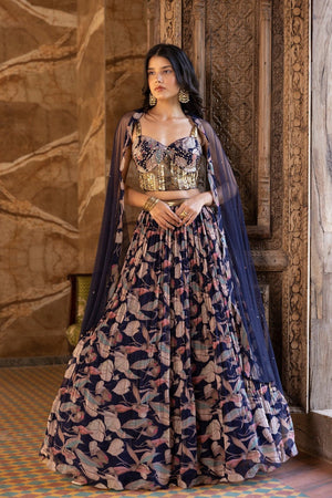 Shop beautiful blue embroidered floral lehenga online in USA with dupatta. Dazzle on weddings and special occasions with exquisite Indian designer dresses, sharara suits, Anarkali suits, bridal lehengas, sharara suits from Pure Elegance Indian clothing store in USA.-front