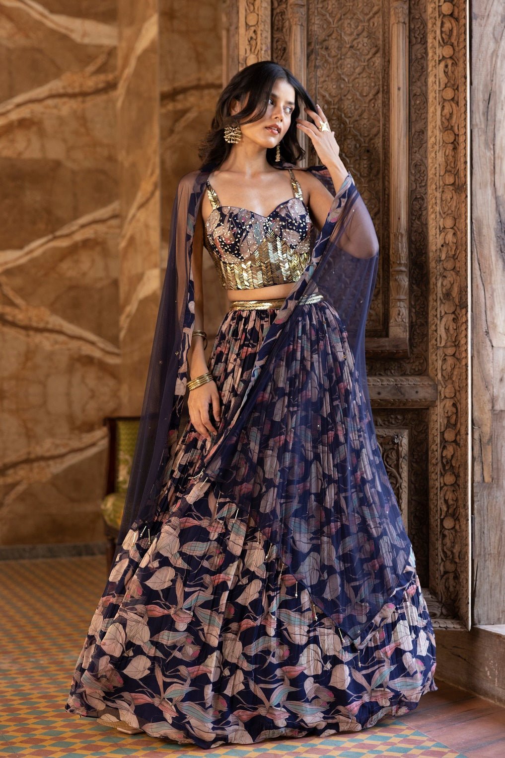 Shop beautiful blue embroidered floral lehenga online in USA with dupatta. Dazzle on weddings and special occasions with exquisite Indian designer dresses, sharara suits, Anarkali suits, bridal lehengas, sharara suits from Pure Elegance Indian clothing store in USA.-full view