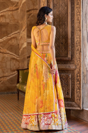 Shop beautiful yellow embroidered floral georgette lehenga online in USA with dupatta. Dazzle on weddings and special occasions with exquisite Indian designer dresses, sharara suits, Anarkali suits, bridal lehengas, sharara suits from Pure Elegance Indian clothing store in USA.-back