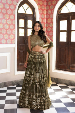 Buy beautiful green sequin embroidery lehenga online in USA with dupatta. Dazzle on weddings and special occasions with exquisite Indian designer dresses, sharara suits, Anarkali suits, bridal lehengas, sharara suits from Pure Elegance Indian clothing store in USA.-front