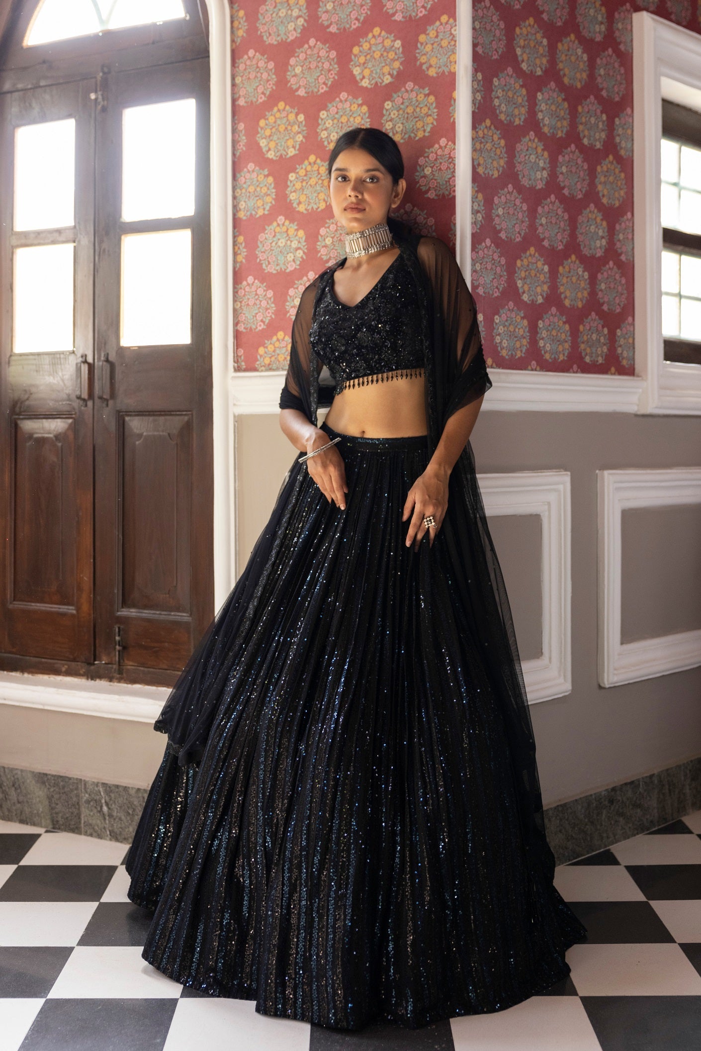 Buy black sequin embroidery lehenga online in USA with velvet blouse and dupatta. Dazzle on weddings and special occasions with exquisite Indian designer dresses, sharara suits, Anarkali suits, bridal lehengas, sharara suits from Pure Elegance Indian clothing store in USA.-full view