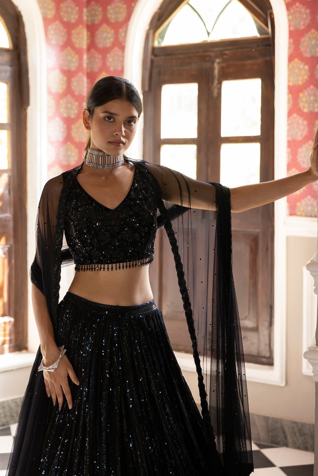 Buy black sequin embroidery lehenga online in USA with velvet blouse and dupatta. Dazzle on weddings and special occasions with exquisite Indian designer dresses, sharara suits, Anarkali suits, bridal lehengas, sharara suits from Pure Elegance Indian clothing store in USA.-closeup