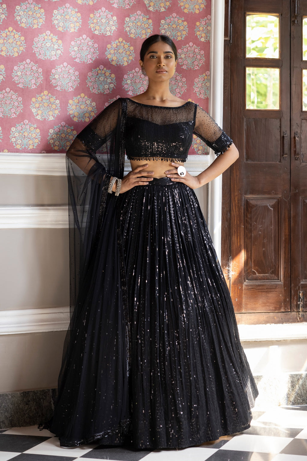 Shop black sequin embroidery lehenga online in USA with embroidered belt and dupatta. Dazzle on weddings and special occasions with exquisite Indian designer dresses, sharara suits, Anarkali suits, bridal lehengas, sharara suits from Pure Elegance Indian clothing store in USA.-full view