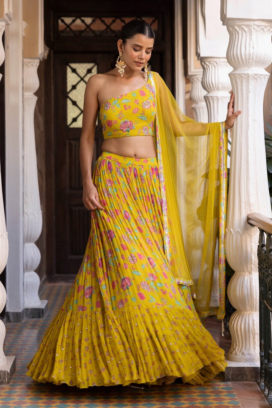 Buy yellow printed georgette georgette lehenga online in USA with dupatta. Dazzle on weddings and special occasions with exquisite Indian designer dresses, sharara suits, Anarkali suits, bridal lehengas, sharara suits from Pure Elegance Indian clothing store in USA.-full view