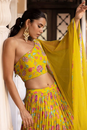 Buy yellow printed georgette georgette lehenga online in USA with dupatta. Dazzle on weddings and special occasions with exquisite Indian designer dresses, sharara suits, Anarkali suits, bridal lehengas, sharara suits from Pure Elegance Indian clothing store in USA.-closeup