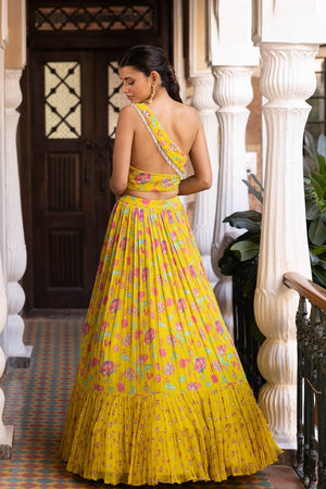 Buy yellow printed georgette georgette lehenga online in USA with dupatta. Dazzle on weddings and special occasions with exquisite Indian designer dresses, sharara suits, Anarkali suits, bridal lehengas, sharara suits from Pure Elegance Indian clothing store in USA.-back