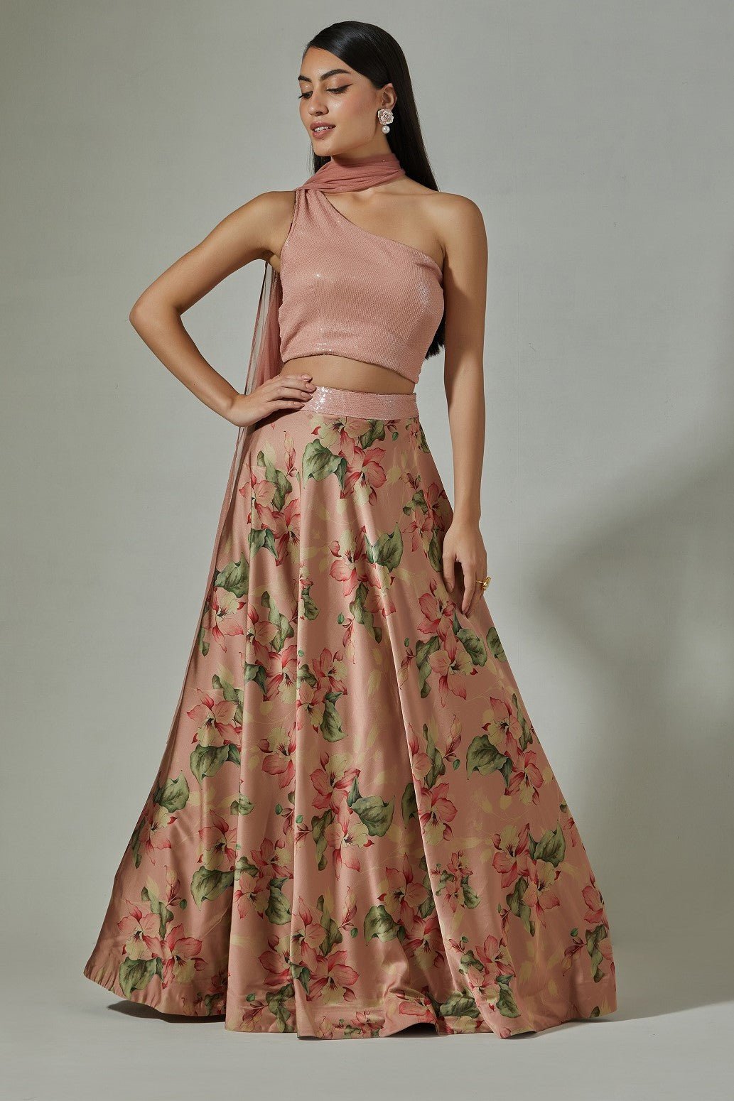 Shop beautiful peach printed designer lehenga online in USA with sequin blouse. Dazzle on weddings and special occasions with exquisite Indian designer dresses, sharara suits, Anarkali suits, wedding lehengas from Pure Elegance Indian fashion store in USA.-full view
