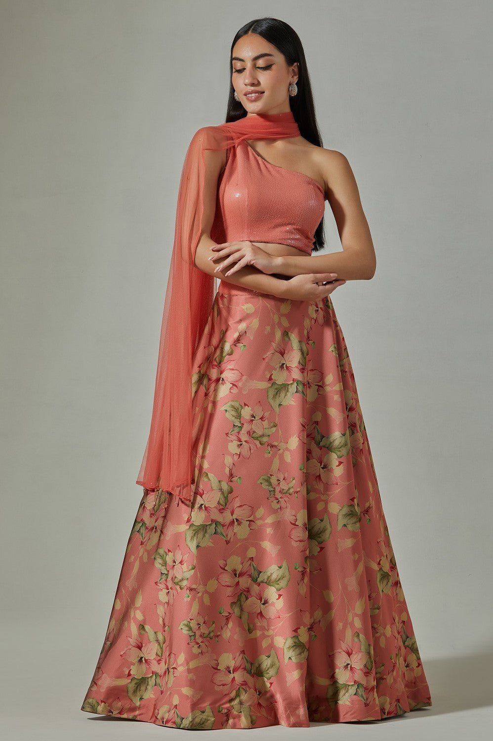 Shop beautiful pink printed satin lehenga online in USA with sequin blouse. Dazzle on weddings and special occasions with exquisite Indian designer dresses, sharara suits, Anarkali suits, wedding lehengas from Pure Elegance Indian fashion store in USA.-full view