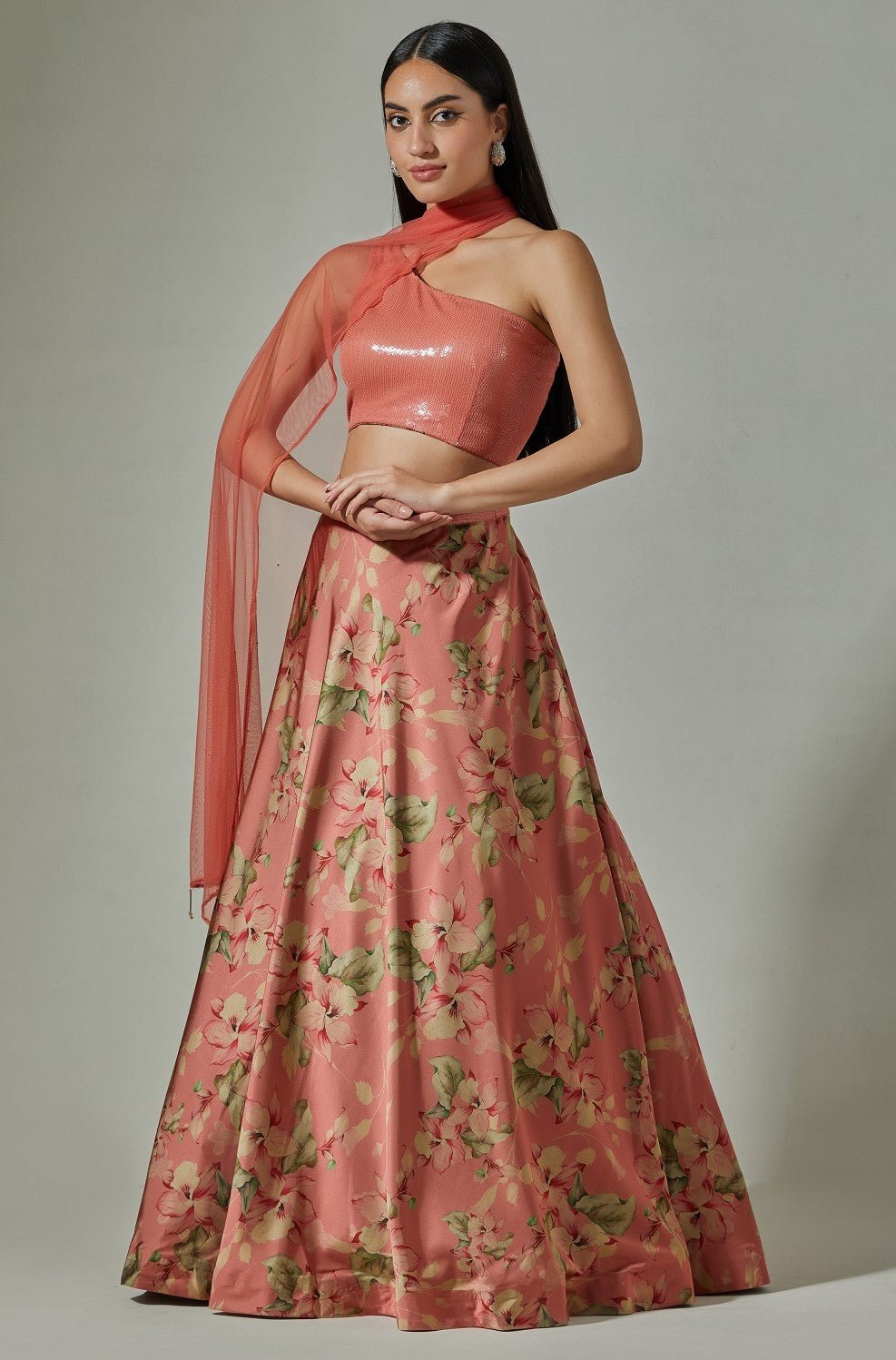 Shop beautiful pink printed satin lehenga online in USA with sequin blouse. Dazzle on weddings and special occasions with exquisite Indian designer dresses, sharara suits, Anarkali suits, wedding lehengas from Pure Elegance Indian fashion store in USA.-side