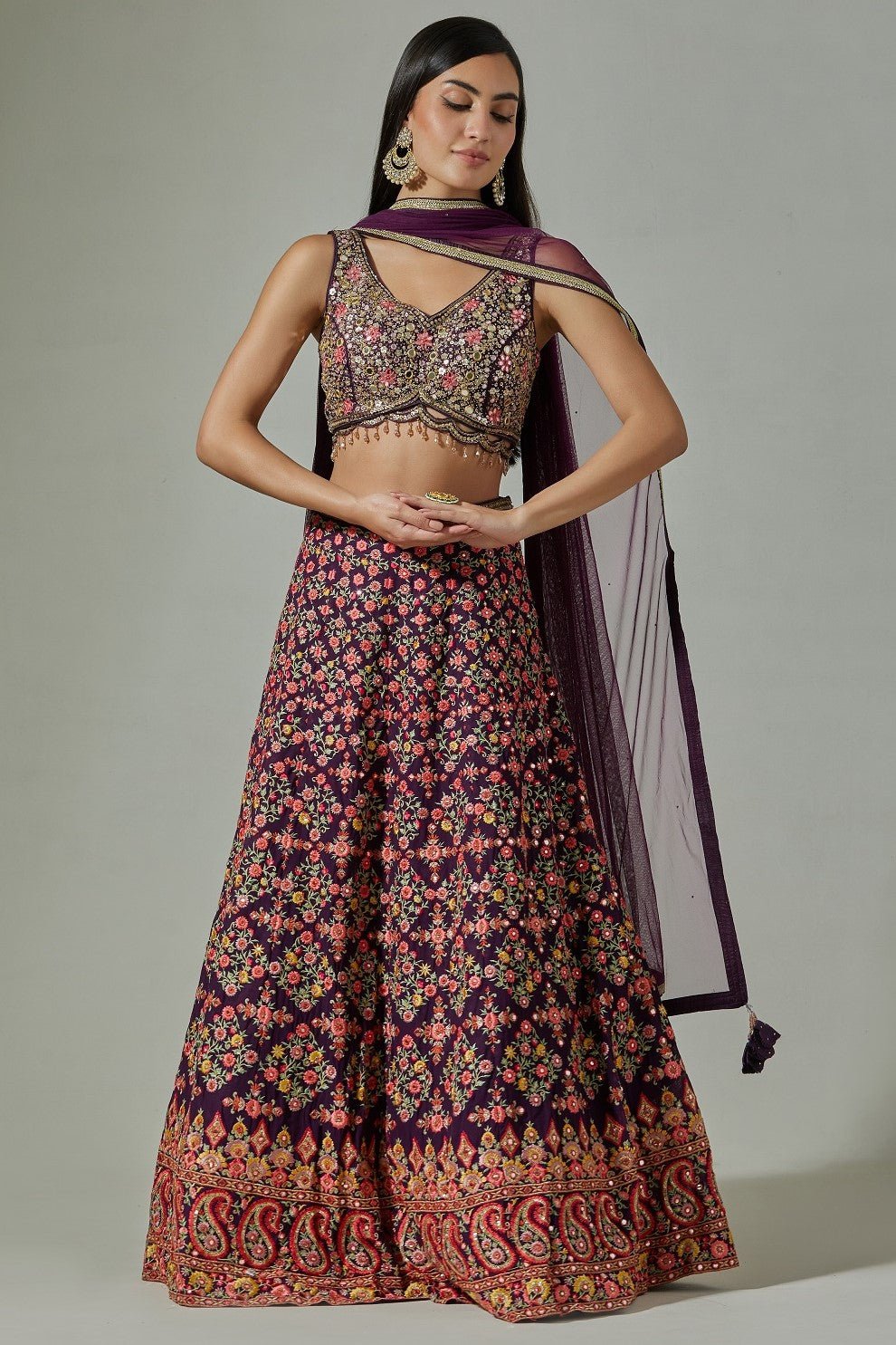 Buy beautiful purple heavy embroidery lehenga online in USA with soft net dupatta. Dazzle on weddings and special occasions with exquisite Indian designer dresses, sharara suits, Anarkali suits, wedding lehengas from Pure Elegance Indian fashion store in USA.-full view