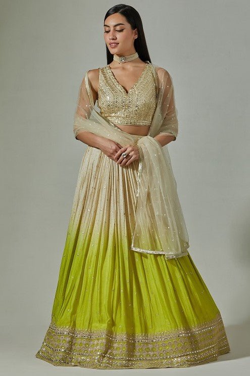 Buy beautiful beige and green ombre crepe lehenga online in USA. Dazzle on weddings and special occasions with exquisite Indian designer dresses, sharara suits, Anarkali suits, wedding lehengas from Pure Elegance Indian fashion store in USA.-full view