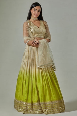 Buy beautiful beige and green ombre crepe lehenga online in USA. Dazzle on weddings and special occasions with exquisite Indian designer dresses, sharara suits, Anarkali suits, wedding lehengas from Pure Elegance Indian fashion store in USA.-front