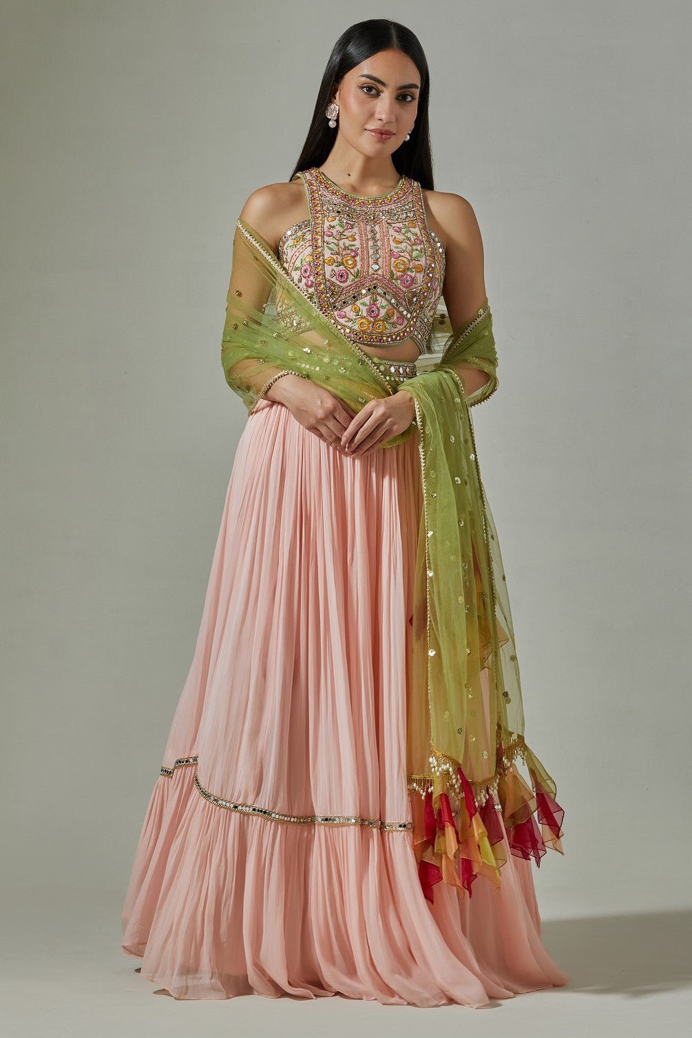 Shop beautiful pink embroidered georgette lehenga online in USA with green dupatta. Dazzle on weddings and special occasions with exquisite Indian designer dresses, sharara suits, Anarkali suits, wedding lehengas from Pure Elegance Indian fashion store in USA.-full view