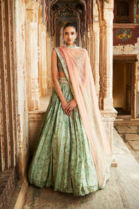 Buy your best on wedding occasions in this stunning green printed jade tissue with a floral creeper in pink & peach. The dupatta is a minimal craft in a Tuscan peach. Shop online from Pure Elegance.- Front View