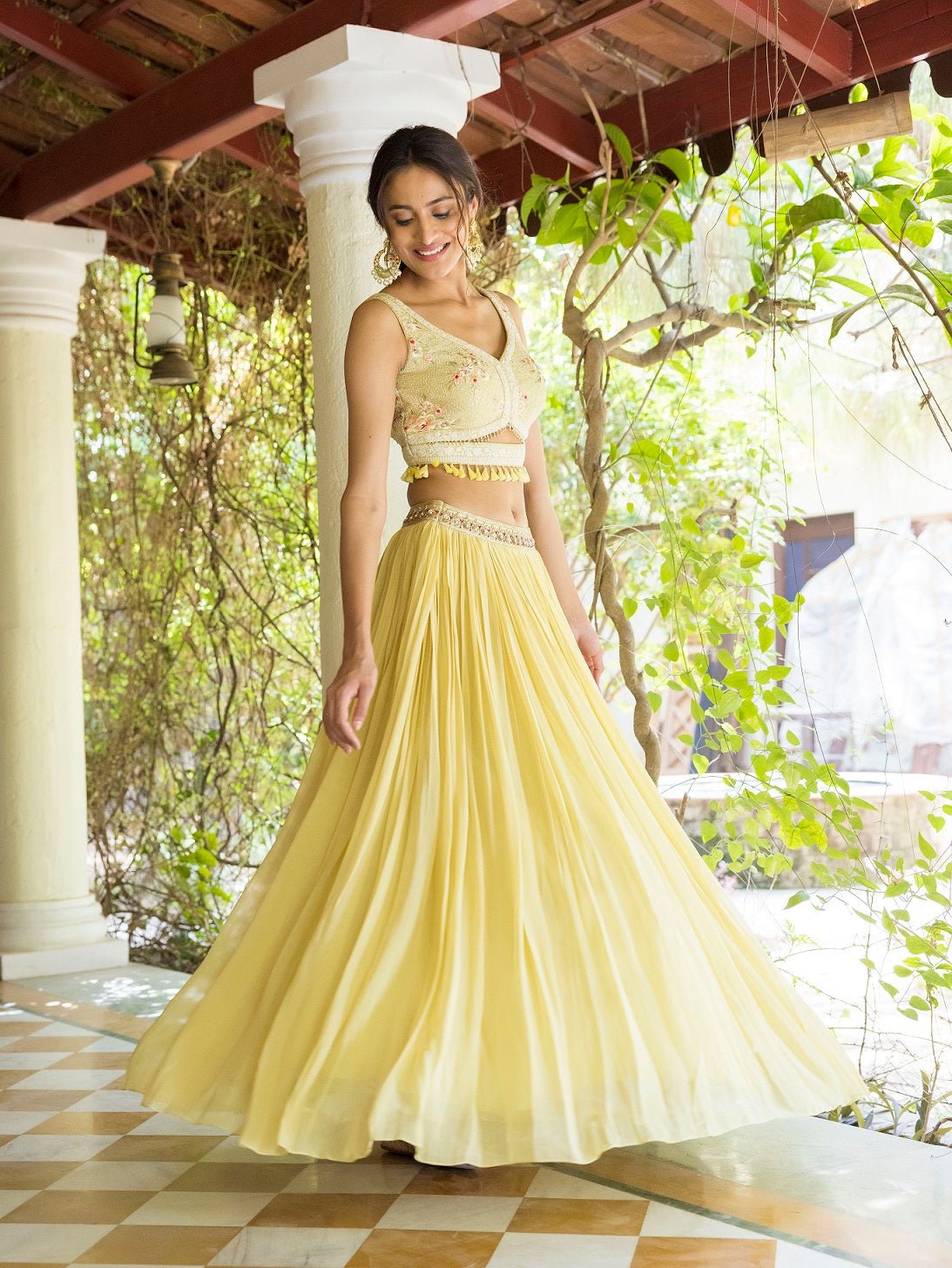 Shop beautiful pista green lehenga online in USA with tassels and cape dupatta. Dazzle on weddings and special occasions with exquisite Indian designer dresses, sharara suits, Anarkali suits, wedding lehengas from Pure Elegance Indian fashion store in USA.-skirt