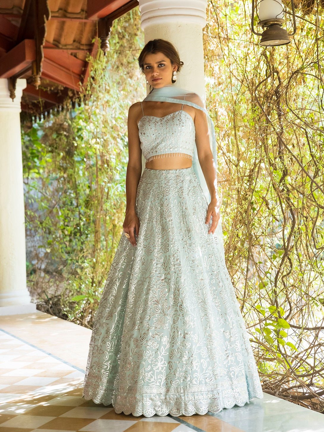 Shop beautiful ice blue 3D embroidery lehenga online in USA with dupatta. Dazzle on weddings and special occasions with exquisite Indian designer dresses, sharara suits, Anarkali suits, wedding lehengas from Pure Elegance Indian fashion store in USA.-front