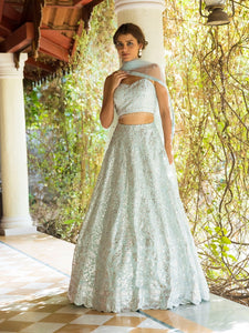 Shop beautiful ice blue 3D embroidery lehenga online in USA with dupatta. Dazzle on weddings and special occasions with exquisite Indian designer dresses, sharara suits, Anarkali suits, wedding lehengas from Pure Elegance Indian fashion store in USA.-full view