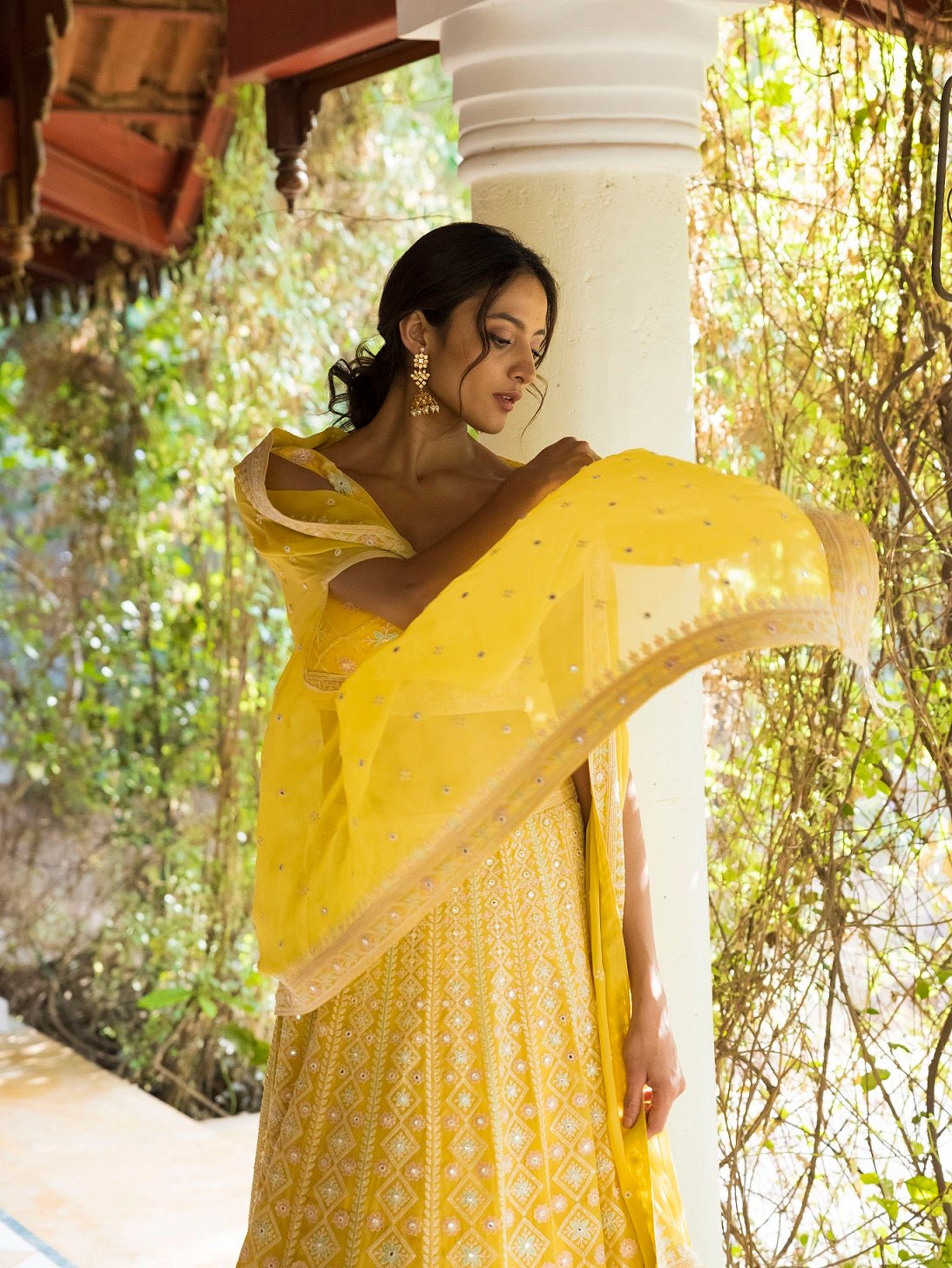 Buy beautiful sunny yellow Lucknowi work lehenga online in USA with dupatta. Dazzle on weddings and special occasions with exquisite Indian designer dresses, sharara suits, Anarkali suits, wedding lehengas from Pure Elegance Indian fashion store in USA.-dupatta