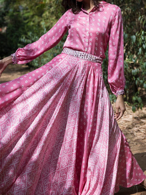 Shop stunning pink bandhej print contemporary skirt set online in USA. Dazzle on weddings and special occasions with exquisite Indian designer dresses, sharara suits, Anarkali suits, wedding lehengas from Pure Elegance Indian fashion store in USA.-skirt