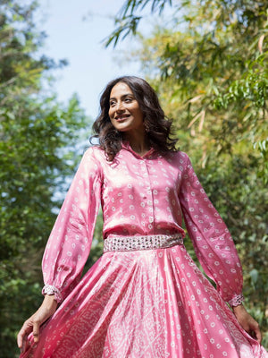 Shop stunning pink bandhej print contemporary skirt set online in USA. Dazzle on weddings and special occasions with exquisite Indian designer dresses, sharara suits, Anarkali suits, wedding lehengas from Pure Elegance Indian fashion store in USA.-blouse