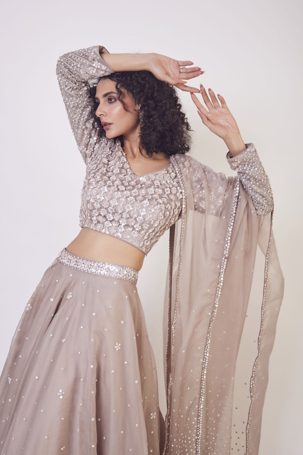 Buy stunning beige lehenga online in USA with dupatta. Get festive ready in beautiful designer Anarkali suits, designer lehenga, wedding gowns, sharara suits, designer sarees from Pure Elegance Indian fashion store in USA.-full view