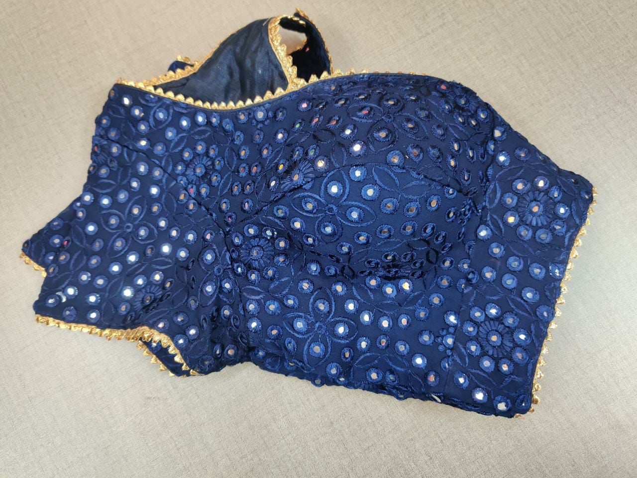 Shop beautiful dark blue mirror work designer sari blouse online in USA. Elevate your Indian ethnic saree looks with beautiful readymade saree blouse, embroidered saree blouses, Banarasi saree blouse, designer sari blouses from Pure Elegance Indian fashion store in USA.-sleeves