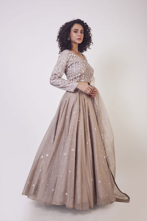 Buy stunning beige lehenga online in USA with dupatta. Get festive ready in beautiful designer Anarkali suits, designer lehenga, wedding gowns, sharara suits, designer sarees from Pure Elegance Indian fashion store in USA.-side