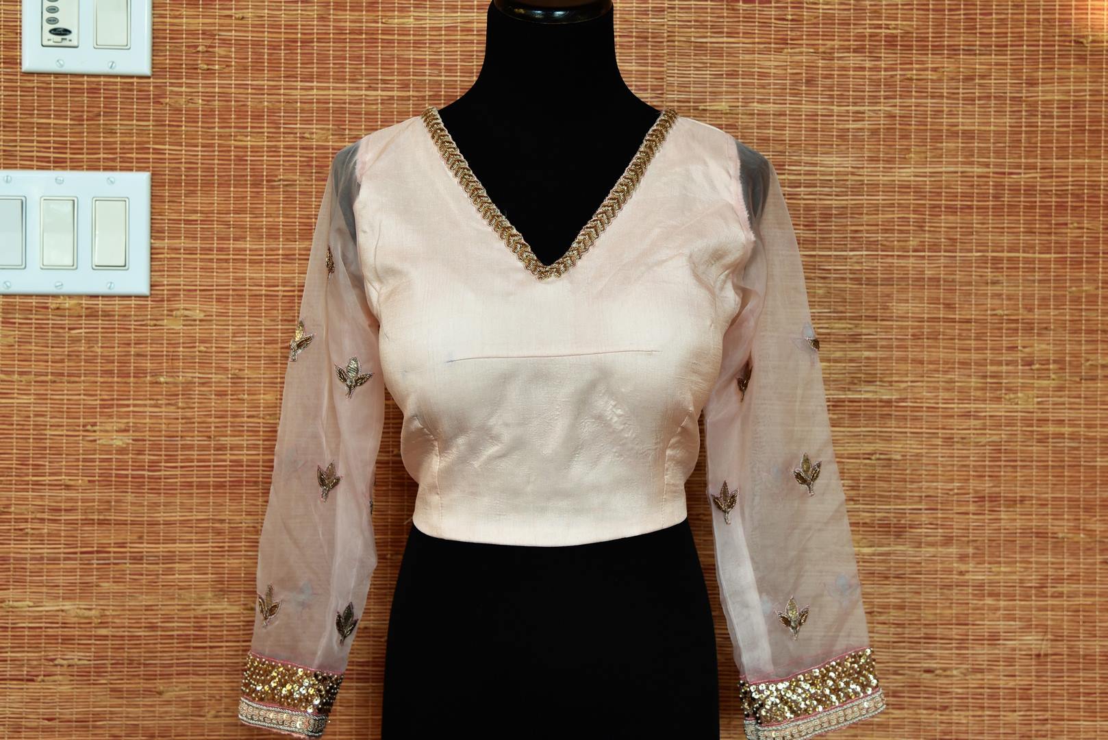 Shop powder pink embroidered raw silk sari blouse online in USA. Elevate your ethnic saree style with a tasteful collection of designer saree blouses from Pure Elegance Indian clothing store in USA.-front