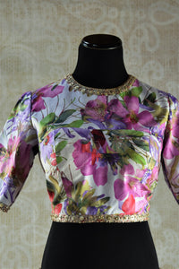 Buy Indian ethnic fashion online at Pure Elegance or our shop in Edison. Floral designer blouse with three-fourth sleeves perfect for any wedding party or sangeet. Front View.
