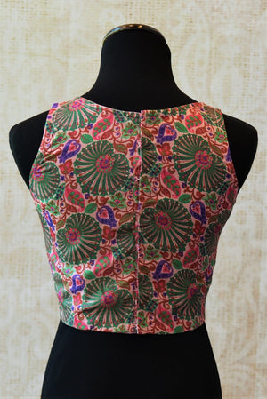 Buy this traditional Indian cotton silk designer blouse from Pure Elegance online or from our store in Edison. It is perfect for any wedding or reception party. Back View.
