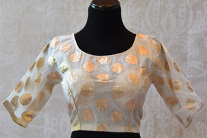 Buy this traditional Indian white designer blouse from Pure Elegance from our store online or from our shop in USA. Three-fourth blouse perfect for any wedding. Front View.