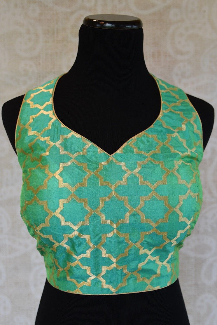 Shop this Indian ethnic Bollywood style designer green blouse from Pure Elegance store in Edison or buy it online. Perfect for any wedding party or reception. Green Blouse.