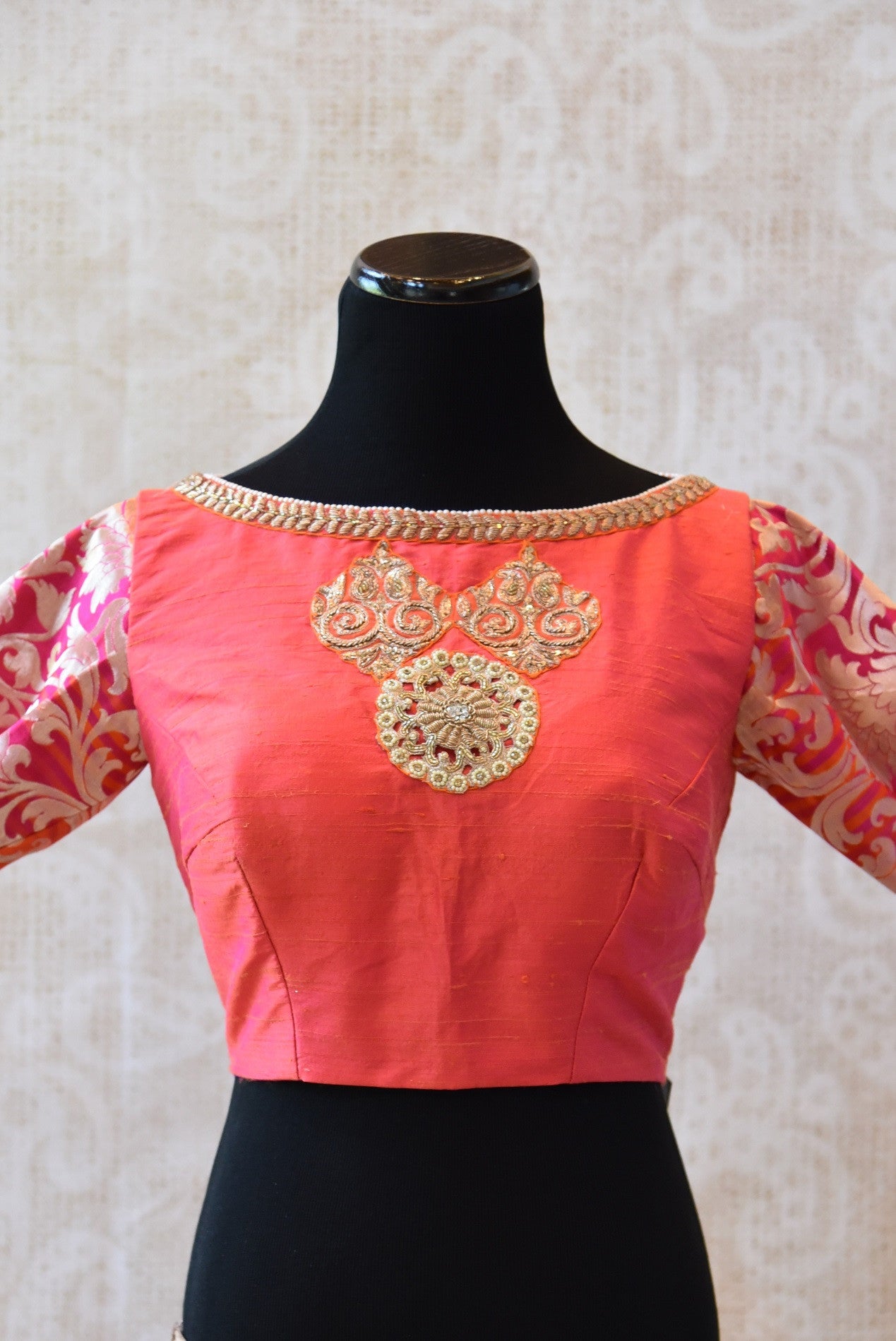 Shop this ethnic Indian raw silk blouse with brocade sleeves from Pure Elegance store in USA and online. It is perfect saree blouse to go for any wedding party. Boatneck.