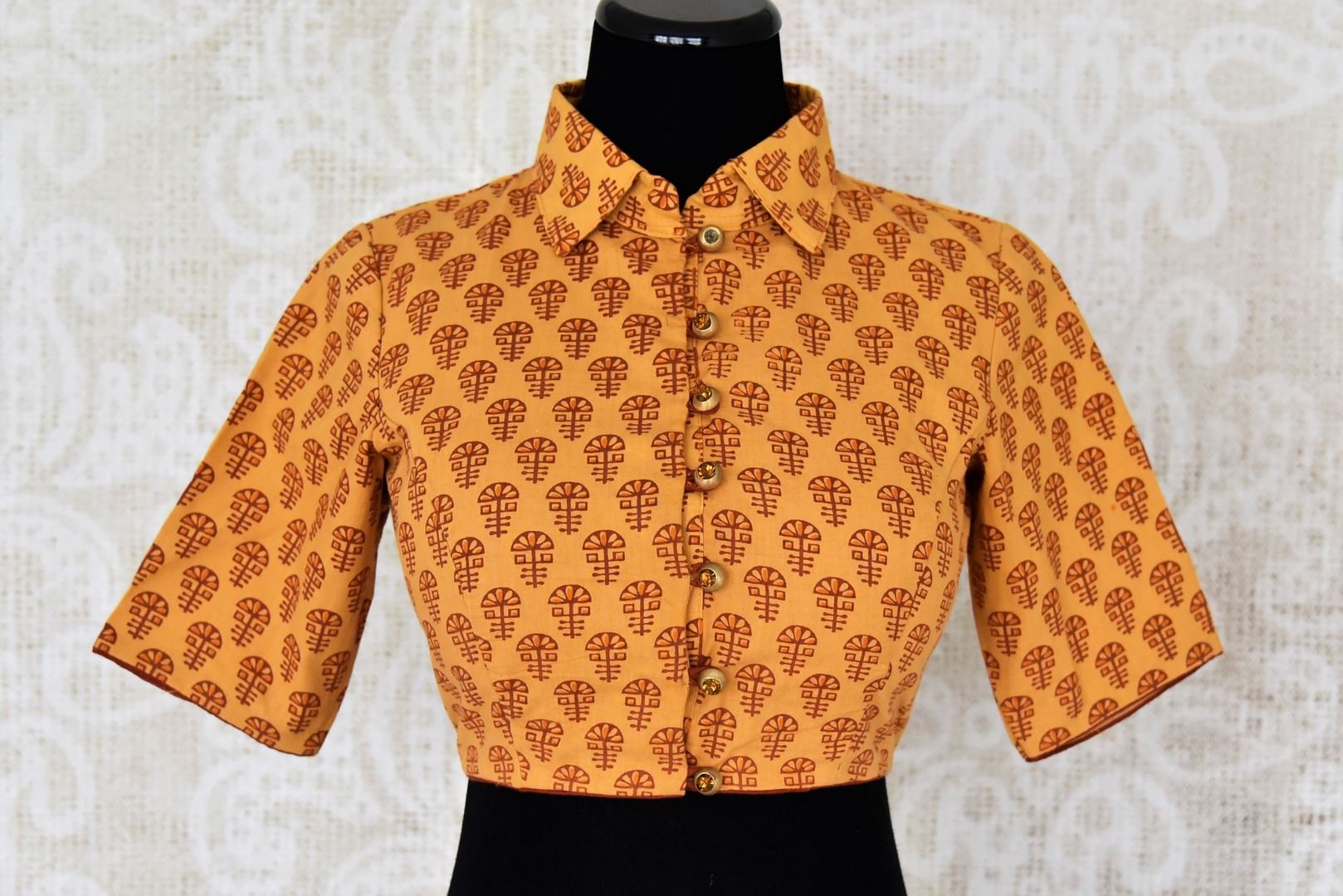 Shop mustard Kalamkari print cotton saree blouse online in USA. Elevate your traditional Indian sarees with matching and contrasting designer sari blouses from Pure Elegance Indian clothing store in USA.-front