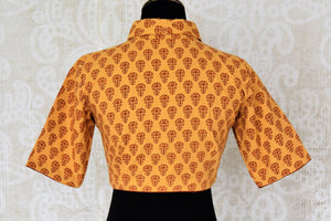 Shop mustard Kalamkari print cotton saree blouse online in USA. Elevate your traditional Indian sarees with matching and contrasting designer sari blouses from Pure Elegance Indian clothing store in USA.-back
