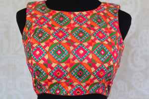 Shop this Indian ethnic crop top style designer blouse with cotton embroidery from Pure Elegance store online or from our shop near NYC. Ideal for any wedding. Crop Top Blouse.