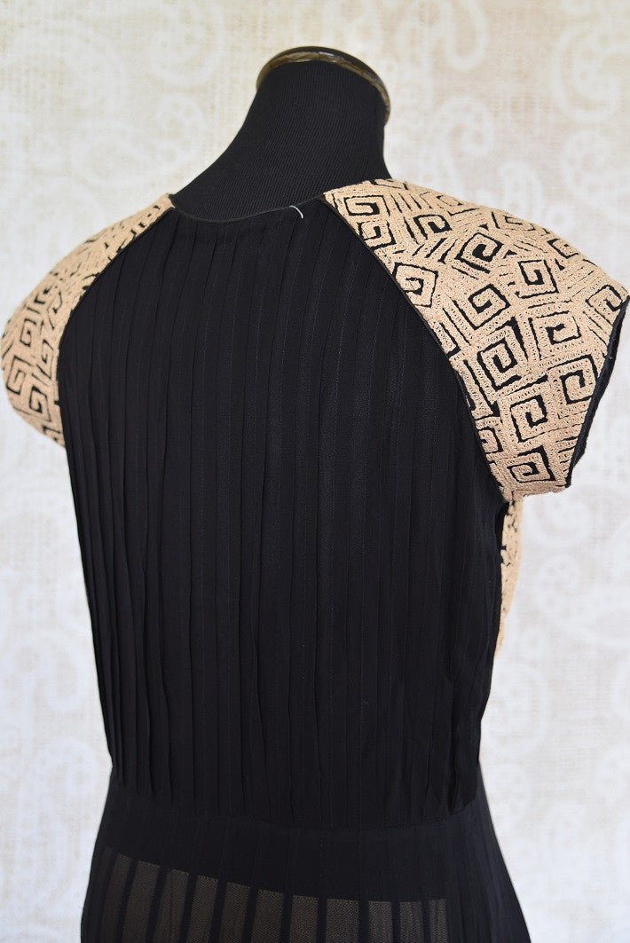 Buy this ethnic Indian black and golden dress online or from our Pure Elegance store in USA. The Bollywood-inspired dress is ideal for any wedding or reception. Back View.