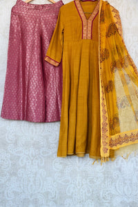 Buy ethnic mustard yellow kurta with Banarasi palazzo online in USA. Exquisite collection of Indian designer suits at Pure Elegance online store in USA. Shop online.-full view