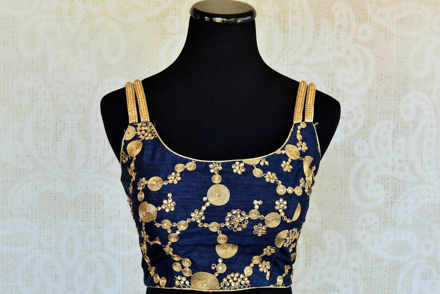 Buy this ethnic Indian designer blouse with golden embroidery on matka silk from Pure Elegance store in USA and online. It is perfect for any reception or prom. Blue Blouse.
