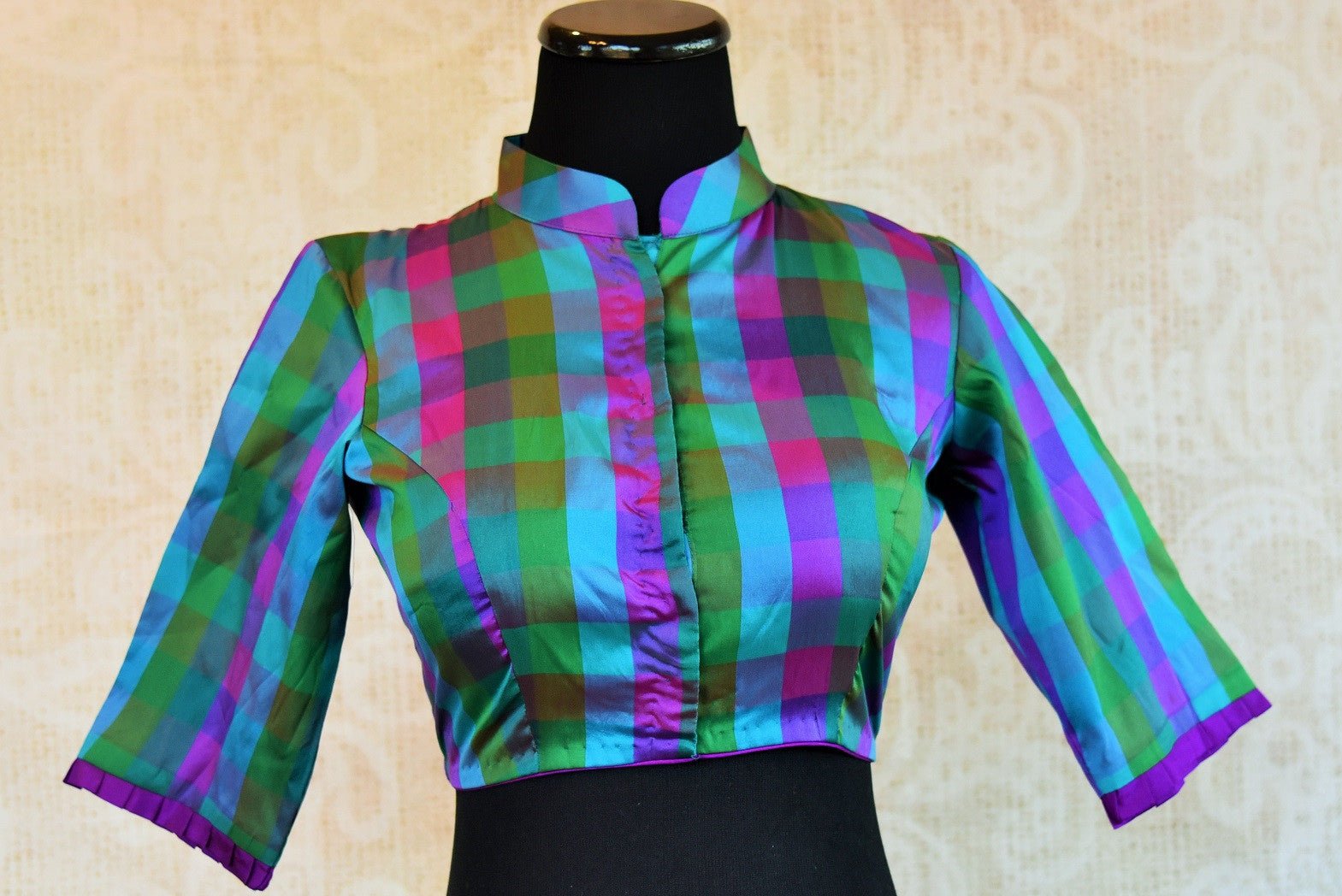 Shop the Indian traditional designer blouse from Pure Elegance store in Edison or online. Ideal for any wedding or reception. Long Sleeves Blue and Green Checks. Blue Green Checks.