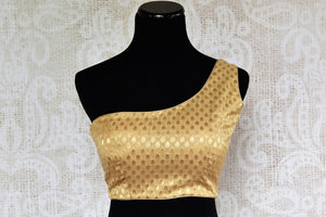 Buy this beautiful Indian gold designer blouse with elegant patterns. Perfect for any festive occasion. Available from Pure Elegance online USA store. - front