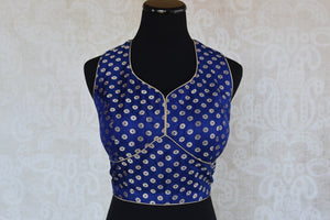 Buy this Indian traditional sleeveless banarasi navy blue blouse from Pure Elegance online or from our store in USA. Perfect for any wedding or reception party. Front View.