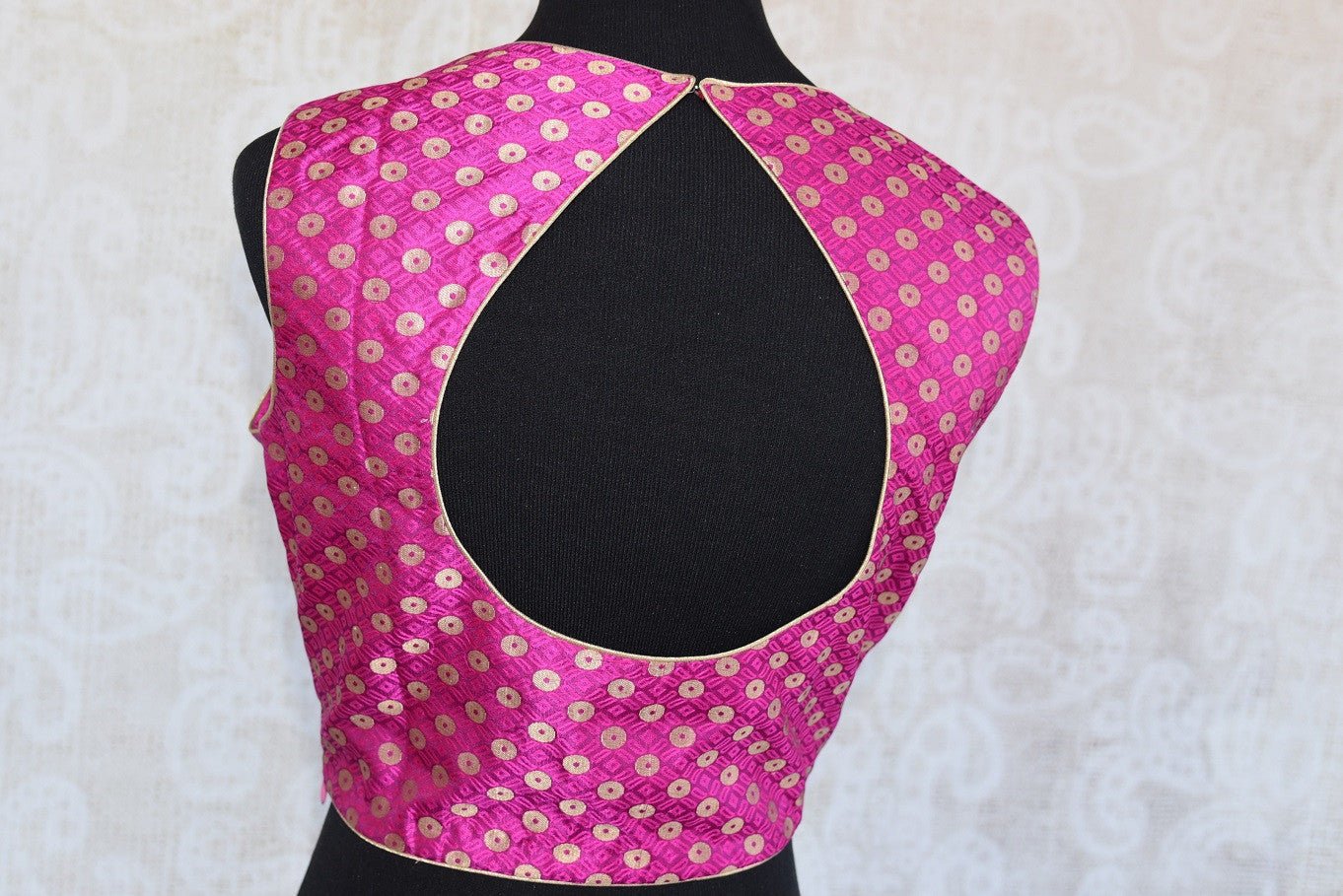 Buy the Indian traditional pink sleeveless banarasi crop top blouse from our Pure Elegance store in Edison near NJ. Perfect for any engagement or wedding party. Back Slit.